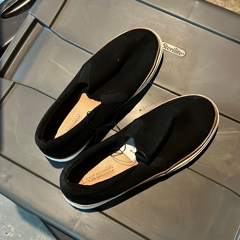 Womens 9.5 W black slip ons. new!